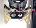 Eye cover hinge bracket removed